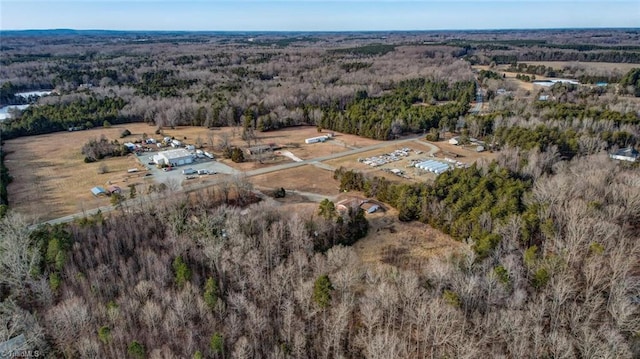 drone / aerial view with a view of trees