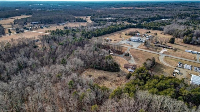 drone / aerial view with a view of trees