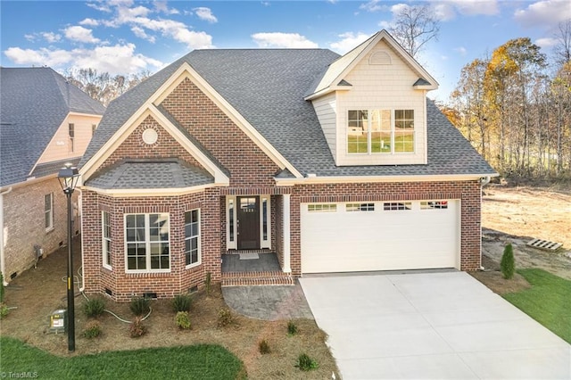 view of front of home with a garage