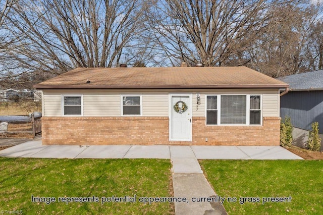 view of front of home featuring a patio area and a front lawn