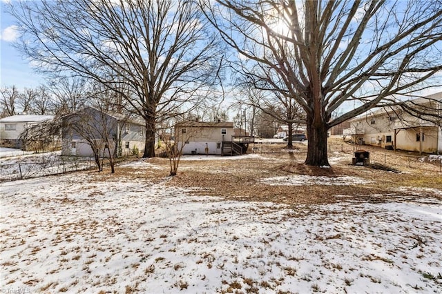 view of yard covered in snow