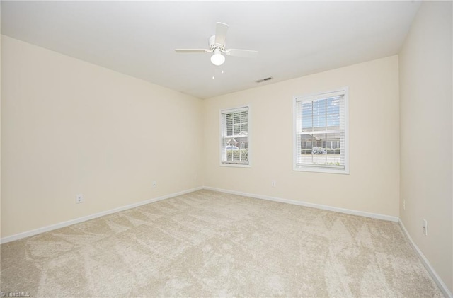 711 Sunset Ave Unit B, Asheboro, NC 27203 - carpeted empty room featuring baseboards and a ceiling fan
