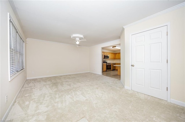 711 Sunset Ave Unit B, Asheboro, NC 27203 - unfurnished living room with light carpet, crown molding, a ceiling fan, and baseboards