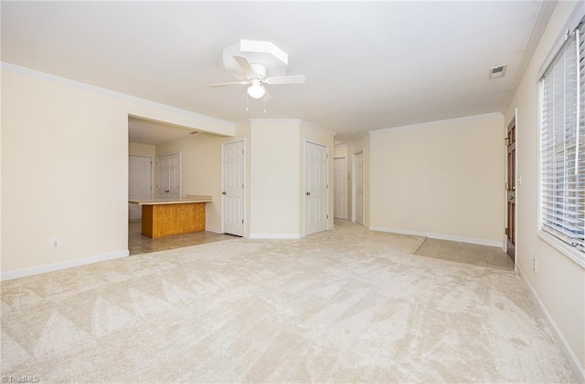 711 Sunset Ave Unit B, Asheboro, NC 27203 - unfurnished living room with light colored carpet, ceiling fan, ornamental molding, and baseboards