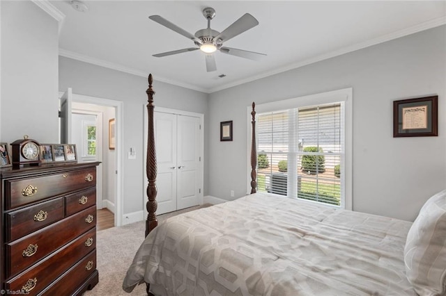 1623 Angus Ridge Dr, Kernersville, NC 27284 - bedroom featuring crown molding, a ceiling fan, carpet floors, and a closet