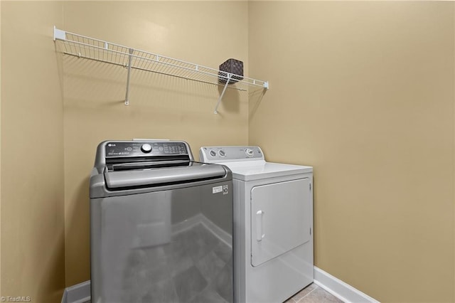 laundry room featuring independent washer and dryer