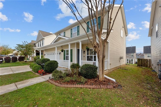 view of front of property featuring covered porch and a front yard