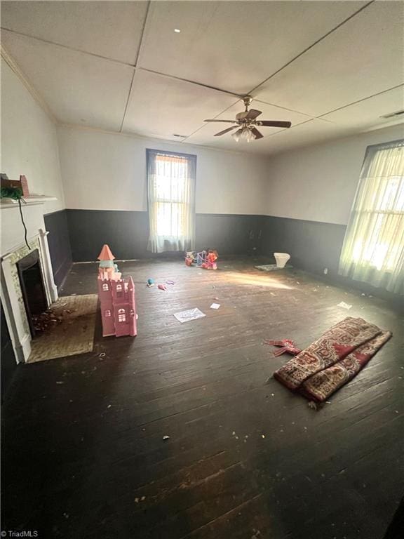 interior space featuring hardwood / wood-style floors and ceiling fan