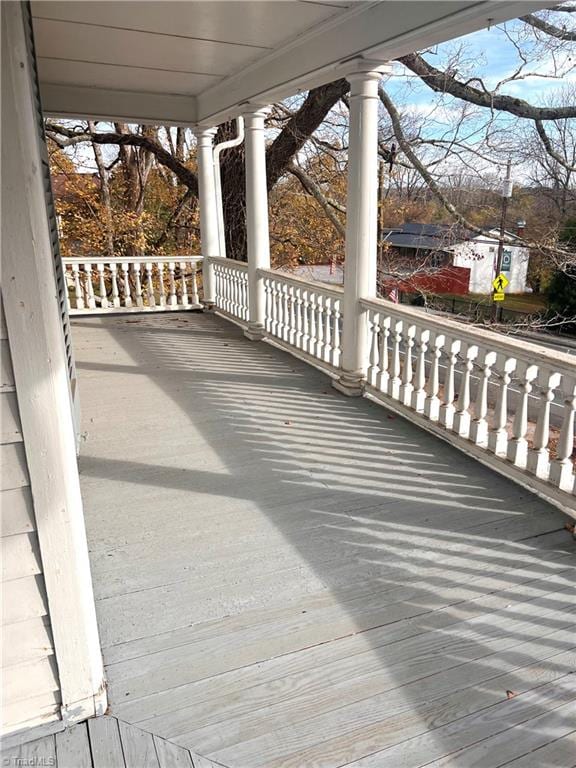 wooden deck featuring a porch