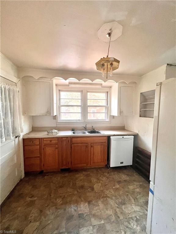 kitchen with white appliances and sink