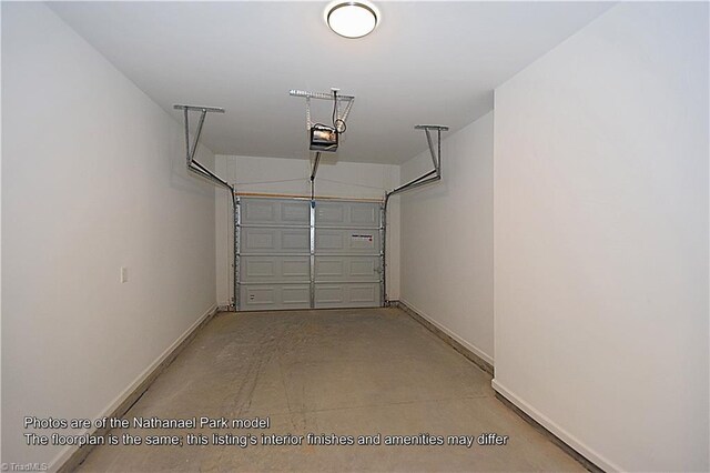 garage with baseboards and a garage door opener