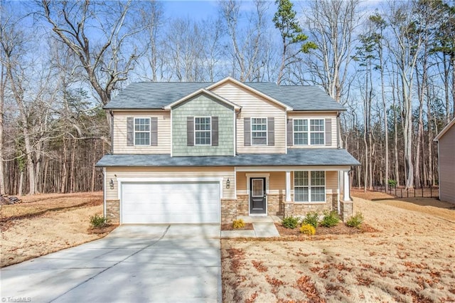 view of front of property featuring a garage