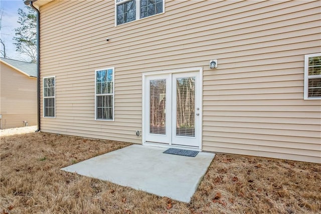 doorway to property featuring a patio area