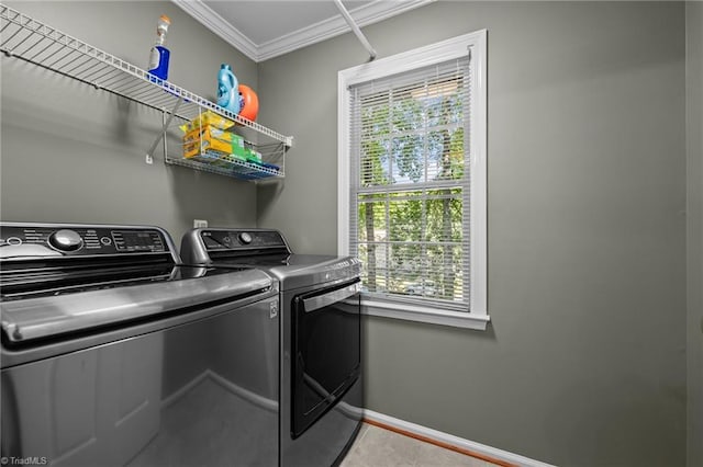 1005 Stuart Dr, Mebane, NC 27302 - laundry area with laundry area, independent washer and dryer, crown molding, light tile patterned floors, and baseboards