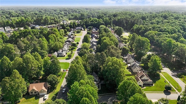1005 Stuart Dr, Mebane, NC 27302 - aerial view featuring a residential view and a wooded view