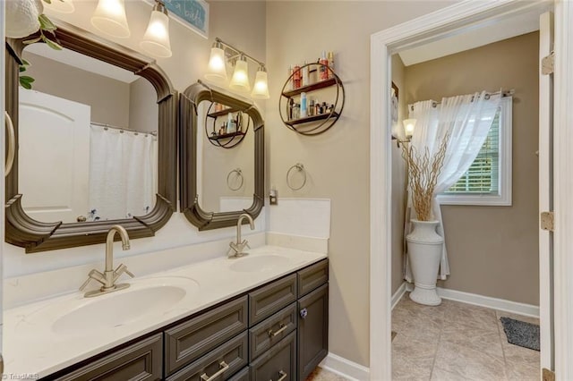 bathroom featuring vanity and tile patterned floors