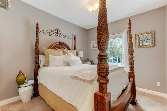 bedroom featuring light colored carpet