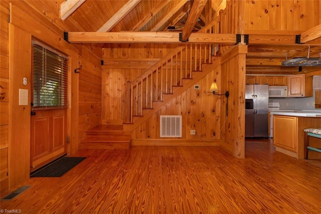 158 Cottontail Ln, North Wilkesboro, NC 28659 - unfurnished living room with wood finished floors, wood walls, wood ceiling, and stairway