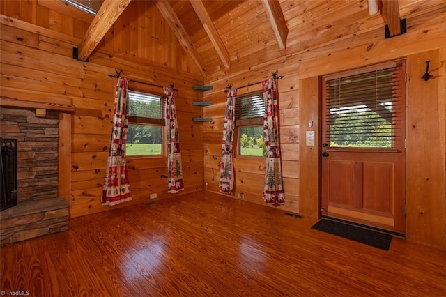 158 Cottontail Ln, North Wilkesboro, NC 28659 - foyer featuring wood finished floors, wood ceiling, wooden walls, and a fireplace