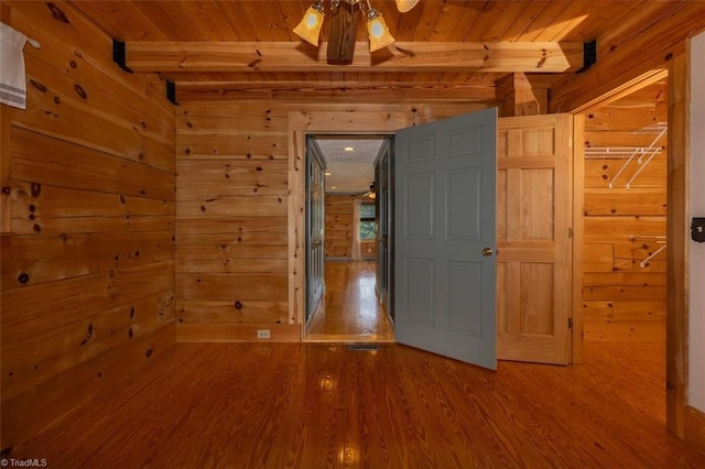 158 Cottontail Ln, North Wilkesboro, NC 28659 - unfurnished bedroom featuring wood walls, a wood ceiling with exposed beams, and wood finished floors
