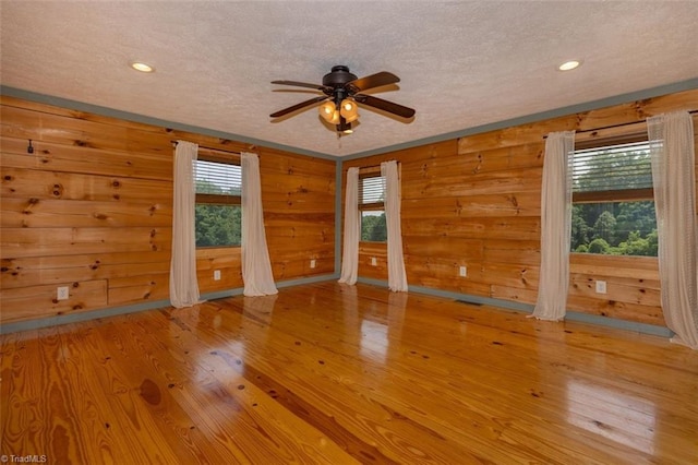 158 Cottontail Ln, North Wilkesboro, NC 28659 - empty room featuring a ceiling fan, a textured ceiling, wood finished floors, and recessed lighting