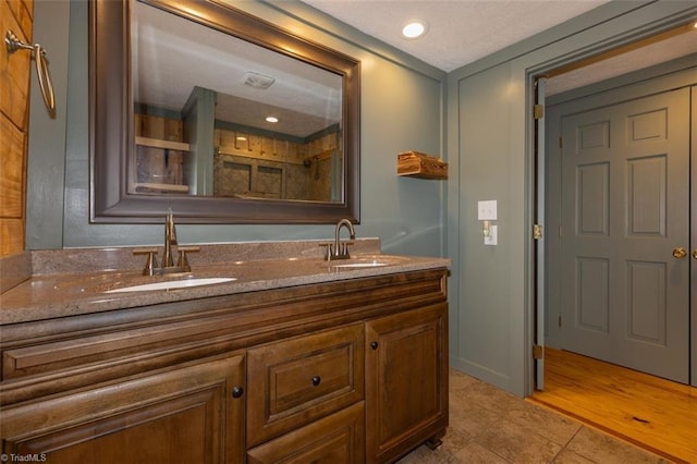 158 Cottontail Ln, North Wilkesboro, NC 28659 - bathroom featuring double vanity, tile patterned flooring, and recessed lighting
