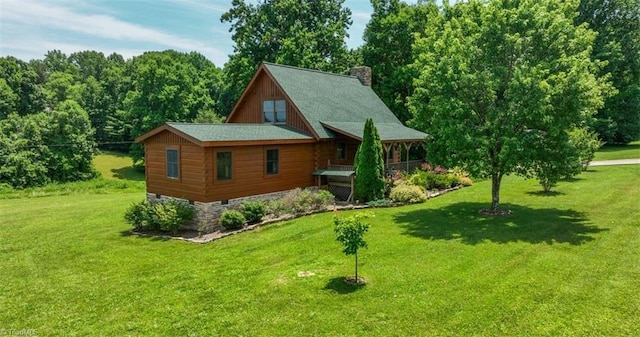 158 Cottontail Ln, North Wilkesboro, NC 28659 - view of side of home featuring a chimney and a yard