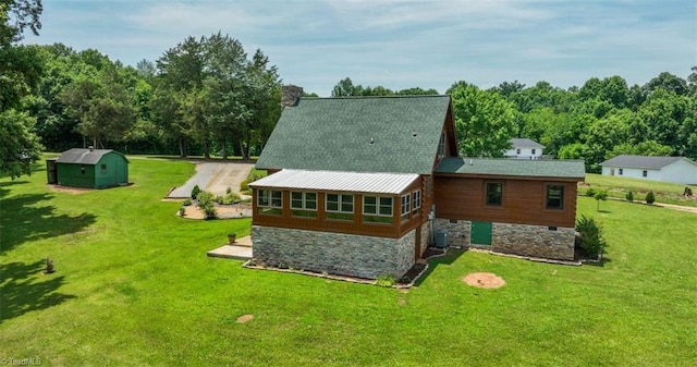 158 Cottontail Ln, North Wilkesboro, NC 28659 - rear view of house featuring a lawn and a storage unit