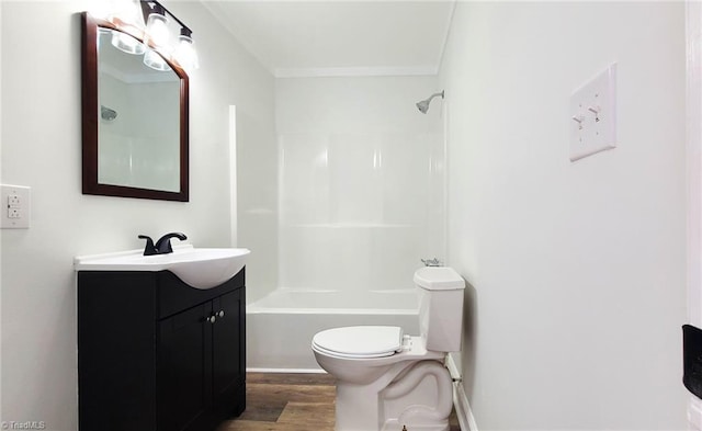 full bathroom with bathtub / shower combination, vanity, toilet, and wood finished floors