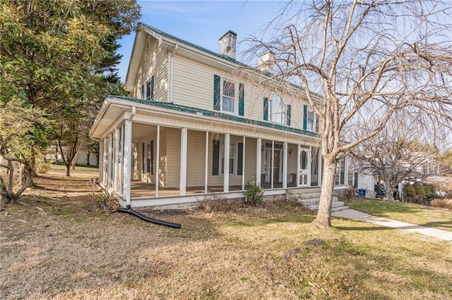 exterior space featuring a front lawn