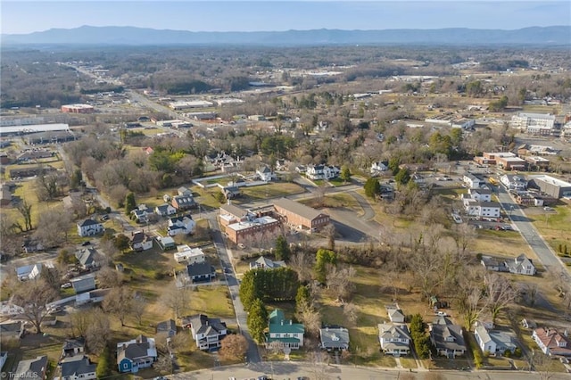 drone / aerial view featuring a mountain view