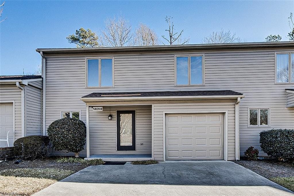 view of front of property with a garage