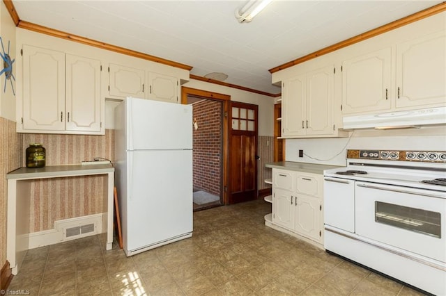 kitchen featuring white cabinetry, crown molding, and white appliances