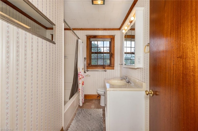 full bathroom with vanity, tile patterned floors, crown molding, toilet, and shower / tub combo