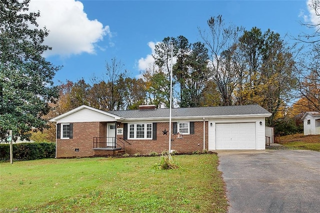 ranch-style house with a garage and a front lawn