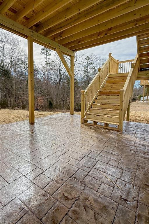 view of patio with stairway