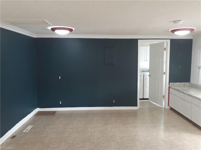 unfurnished room featuring electric panel, crown molding, and a textured ceiling