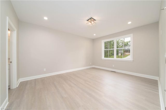 2578 Whipporwill Ct, Rural Hall, NC 27045 - unfurnished room featuring light wood-type flooring, baseboards, and recessed lighting