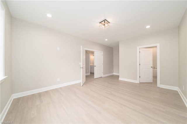 2578 Whipporwill Ct, Rural Hall, NC 27045 - spare room with light wood finished floors, baseboards, and recessed lighting
