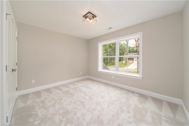 2578 Whipporwill Ct, Rural Hall, NC 27045 - spare room featuring baseboards and light carpet