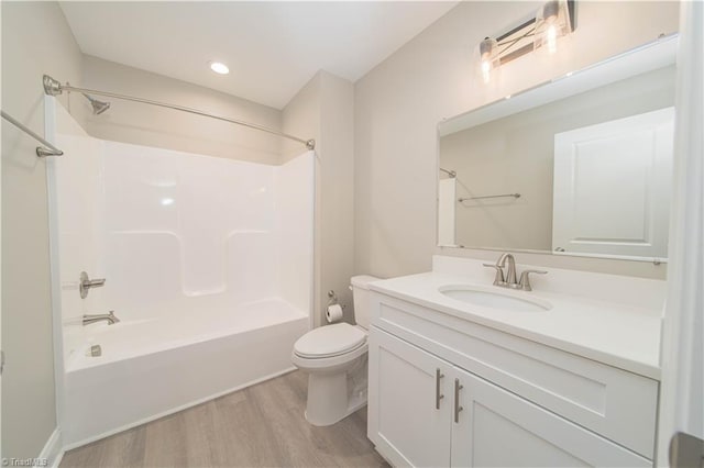 2578 Whipporwill Ct, Rural Hall, NC 27045 - bathroom with toilet, vanity, wood finished floors, bathing tub / shower combination, and recessed lighting
