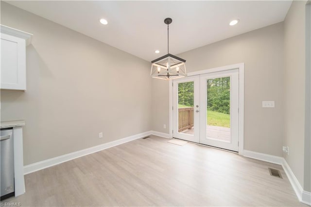 2578 Whipporwill Ct, Rural Hall, NC 27045 - unfurnished dining area featuring light wood-style flooring, a chandelier, french doors, baseboards, and recessed lighting