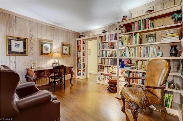 sitting room with hardwood / wood-style flooring