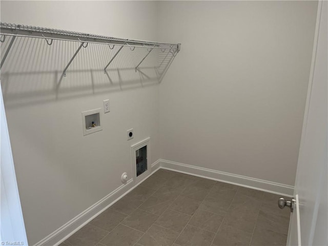 washroom featuring hookup for a washing machine, baseboards, gas dryer hookup, hookup for an electric dryer, and laundry area