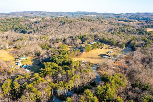 bird's eye view featuring a forest view