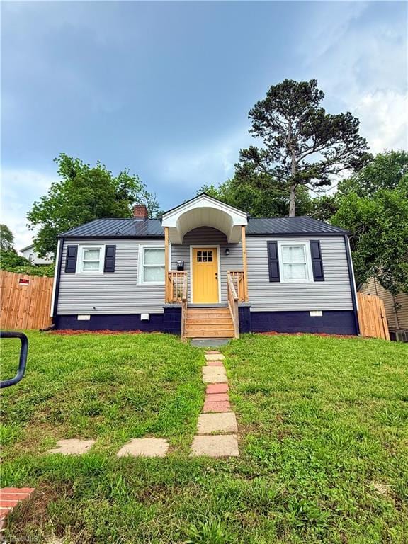 429 Gregory St, Winston-Salem, NC 27101 - manufactured / mobile home featuring metal roof, crawl space, and a chimney