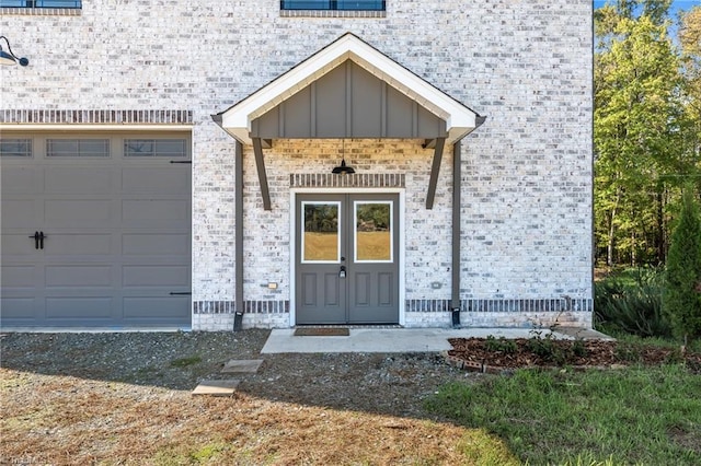 entrance to property featuring a garage