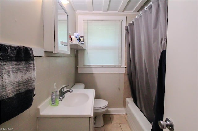 bathroom with toilet, tile patterned floors, shower / bath combination with curtain, and vanity