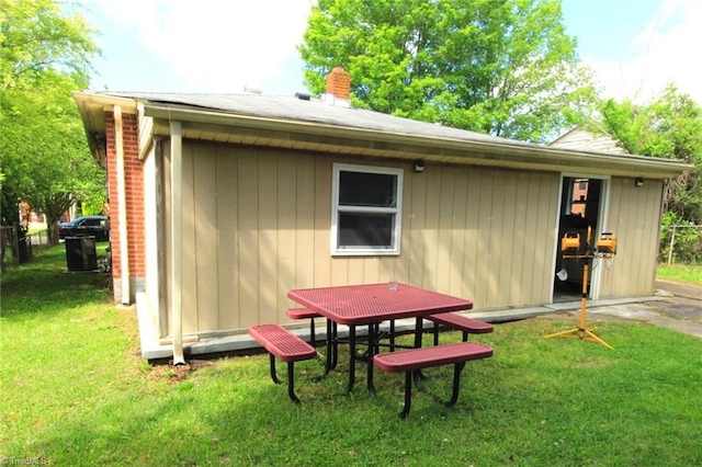 view of outdoor structure with fence