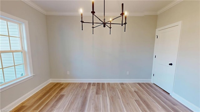 3043 Loch Dr, Winston-Salem, NC 27106 - unfurnished dining area featuring a chandelier, light wood-style floors, healthy amount of natural light, and ornamental molding